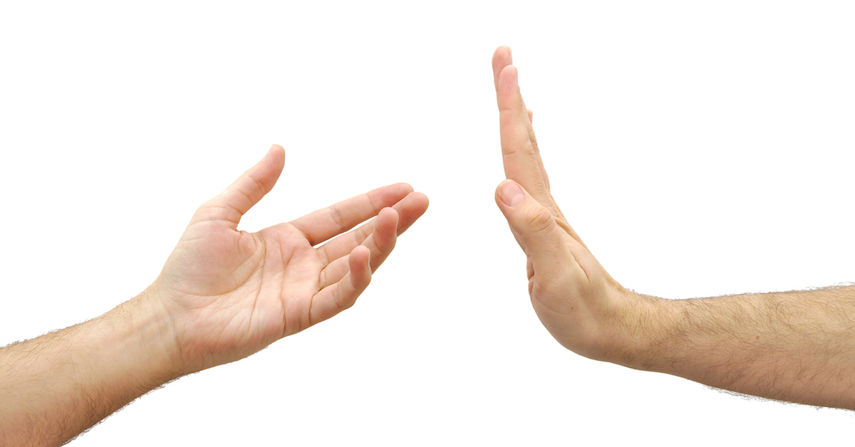 Man hand refusing to help – being selfish